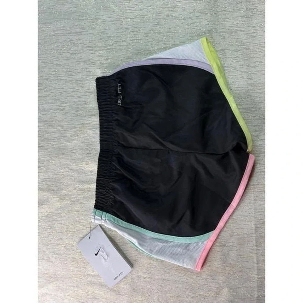 Three pairs of kids Nike dri fit short size 6